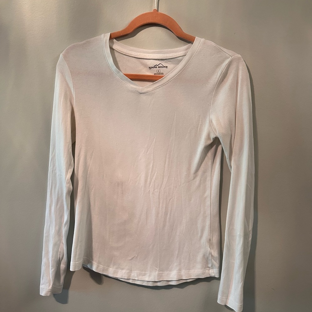 White long sleeve Eddie Bauer shirt.